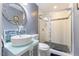 Contemporary bathroom featuring a glass-enclosed shower, vessel sink, and modern finishes at 1355 Bowling Road, Fuquay Varina, NC 27526