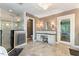 Bathroom featuring a walk in shower, vanity, and bright patterned floors at 1355 Bowling Road, Fuquay Varina, NC 27526