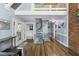 Inviting entryway featuring a spiral staircase, hardwood floors, and access to other rooms at 1355 Bowling Road, Fuquay Varina, NC 27526