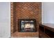 This striking fireplace is a prominent feature in this rustic living space at 1355 Bowling Road, Fuquay Varina, NC 27526