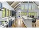 Bright kitchen boasting ample natural light, granite countertops, and stainless steel appliances at 1355 Bowling Road, Fuquay Varina, NC 27526