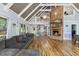 Spacious living room with high ceilings, a fireplace, and hardwood floors at 1355 Bowling Road, Fuquay Varina, NC 27526