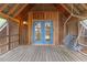 Charming porch with hammock and rustic wood features at 1355 Bowling Road, Fuquay Varina, NC 27526