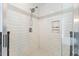 Walk-in shower features white subway tile with a tiled shower niche at 1355 Bowling Road, Fuquay Varina, NC 27526