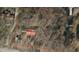 An aerial view depicts a house inside a parcel surrounded by woods, with property lines marked at 1622 N Carolina 98 Hwy W, Louisburg, NC 27549