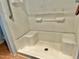 Accessible shower unit with built in seating and tile walls at 1622 N Carolina 98 Hwy W, Louisburg, NC 27549