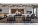 Entertaining space featuring a kitchenette with stainless steel appliances and a spacious island with barstool seating at 1809 Angelonia Way, Fuquay Varina, NC 27526