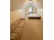 Finished attic space with a couch and a bed at 20 Willows Den Ct, Youngsville, NC 27596