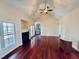 Spacious living room with hardwood floors, a fireplace, and natural light at 20 Willows Den Ct, Youngsville, NC 27596