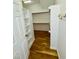 Walk-in closet with built-in shelving and ample storage space, ensuring organization at 20 Willows Den Ct, Youngsville, NC 27596