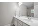 Spacious bathroom featuring double sinks, modern fixtures, and vanity at 2007 Watson Rd, Durham, NC 27704