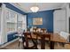 Traditional dining room boasting hardwood floors, a picture window, and stylish decor at 2007 Watson Rd, Durham, NC 27704