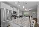 Stylish kitchen with a large island, stainless steel appliances, and an open design at 2007 Watson Rd, Durham, NC 27704