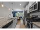 Well-equipped kitchen with granite countertops and stainless steel appliances at 2007 Watson Rd, Durham, NC 27704