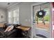 Inviting living room with large windows and a stylish entryway at 2007 Watson Rd, Durham, NC 27704