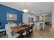 Open-concept kitchen, dining, and living area allows for seamless entertaining and bright living at 2007 Watson Rd, Durham, NC 27704