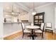 Cozy dining nook with a table, chairs, and elegant lighting fixtures at 214 Lions Gate Dr, Cary, NC 27518