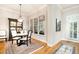 Charming dining area with a round table, chairs, and natural light at 214 Lions Gate Dr, Cary, NC 27518