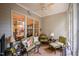 Cozy screened porch with comfortable seating and tranquil ambiance at 214 Lions Gate Dr, Cary, NC 27518