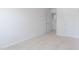 Neutral carpeted bedroom with a door to the hallway and a closet door at 2144 Monk Dr, Haw River, NC 27258