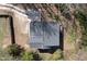 Aerial view of a well-maintained house with a gray roof and a concrete driveway, providing a sense of privacy at 218 Archdale Dr, Durham, NC 27707