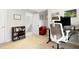 Bedroom with a desk, adjacent open door and stairway, and decor at 218 Archdale Dr, Durham, NC 27707