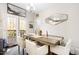 Dining area featuring hardwood floors and doors to outdoor patio at 218 Archdale Dr, Durham, NC 27707