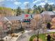 Aerial view of townhomes with lush surrounding greenery and mature trees at 222 Lions Gate Dr, Cary, NC 27518
