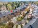 Aerial view of a multi story condo building with decks, landscaping, and nearby street at 222 Lions Gate Dr, Cary, NC 27518