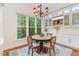 Cozy dining area with large windows and custom built-in cabinetry at 222 Lions Gate Dr, Cary, NC 27518