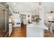Bright, open kitchen with stainless steel appliances and a view into other living spaces at 222 Lions Gate Dr, Cary, NC 27518