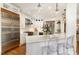 Modern kitchen with stainless steel appliances, quartz countertops, and custom cabinets at 222 Lions Gate Dr, Cary, NC 27518