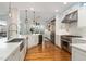 Gourmet kitchen featuring stainless steel appliances and a large island with seating at 222 Lions Gate Dr, Cary, NC 27518