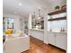 Inviting living area with hardwood floors, seamlessly connected to the modern kitchen at 222 Lions Gate Dr, Cary, NC 27518