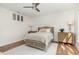 Comfortable main bedroom with a ceiling fan, panel molding, a neutral palette, and natural light at 222 Lions Gate Dr, Cary, NC 27518