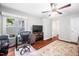 Well-lit office space with ceiling fan and a desk with comfortable chair at 227 Chimney Rise Dr, Cary, NC 27511