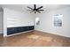 Spacious living room with built-in shelving and cabinets, offering ample storage and a clean, modern aesthetic at 2517 Newbold St, Raleigh, NC 27603