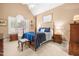 Inviting main bedroom with vaulted ceilings, large windows, and a cozy sitting area at 255 Williamston Ridge Dr, Youngsville, NC 27596