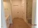 Elegant bathroom with a glass shower door and a clean, modern design at 2617 Packhouse Rd, Zebulon, NC 27597
