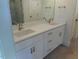 Double sink bathroom vanity with modern fixtures and elegant design at 2617 Packhouse Rd, Zebulon, NC 27597