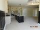 Modern kitchen featuring a large island, stainless steel appliances, and sleek cabinetry, perfect for cooking and entertaining at 2617 Packhouse Rd, Zebulon, NC 27597