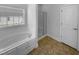 Bathroom with soaking tub and a separate shower at 30 Alvis Ct, Fuquay Varina, NC 27526