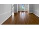 Inviting foyer boasts hardwood floors and a decorative front door at 30 Alvis Ct, Fuquay Varina, NC 27526