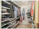 Spacious walk-in closet with ample shelving, organized clothing racks, and great storage solutions at 3016 Sylvania Dr, Raleigh, NC 27607