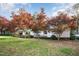 Charming single-story home with well-manicured lawn and beautiful, mature trees in a peaceful neighborhood at 3016 Sylvania Dr, Raleigh, NC 27607