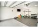 Spacious garage transformed into a home gym, with modern equipment and ample space for workouts at 3016 Sylvania Dr, Raleigh, NC 27607
