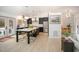 Modern kitchen featuring sleek cabinetry, stainless steel appliances, a center island with bar seating, and stylish lighting at 3016 Sylvania Dr, Raleigh, NC 27607