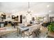 Spacious open-concept layout seamlessly connects the kitchen, dining, and living areas, perfect for modern living and entertaining at 3016 Sylvania Dr, Raleigh, NC 27607