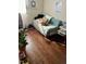 Comfortable bedroom features hardwood floors and natural light at 3414 Renee Dr, Sanford, NC 27332