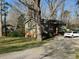 Home exterior on a large lot surrounded by mature trees at 3414 Renee Dr, Sanford, NC 27332